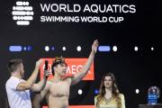游泳——世界杯布达佩斯站：覃海洋100米蛙泳夺冠